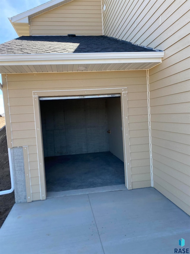 garage with wood walls