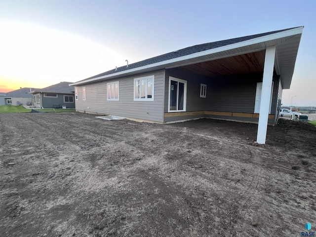 view of property exterior at dusk