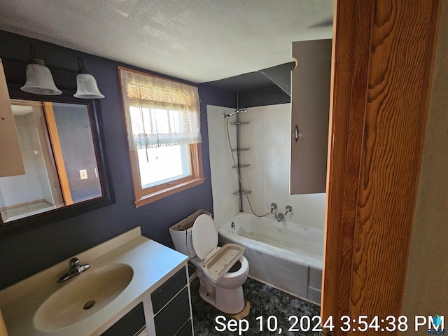 full bathroom with vanity, toilet, a textured ceiling, and bathing tub / shower combination