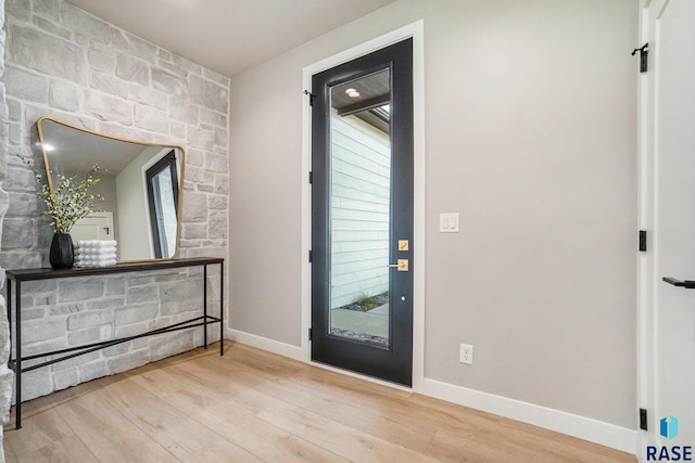 entrance foyer with hardwood / wood-style floors