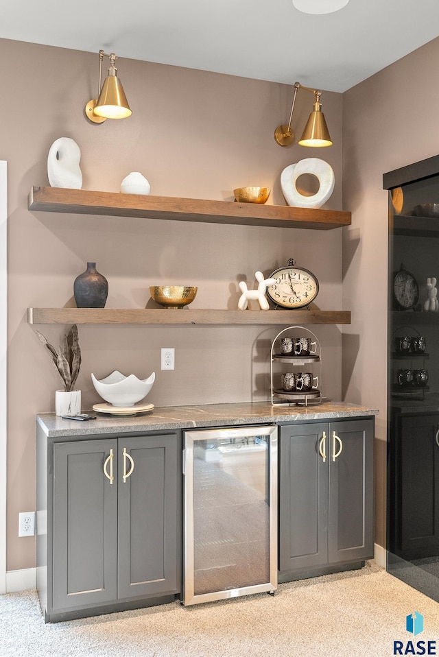 bar with gray cabinets and wine cooler