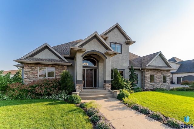 view of front of home with a front lawn