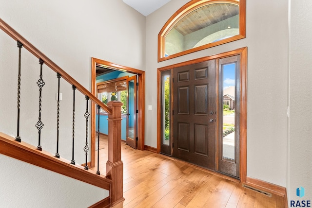 entrance foyer with light hardwood / wood-style flooring