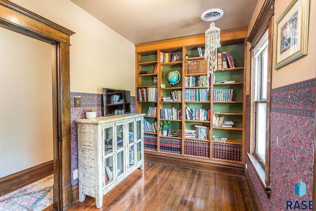 sitting room featuring hardwood / wood-style flooring