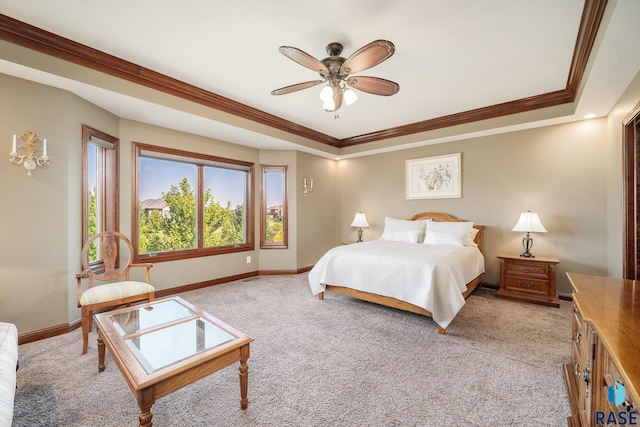 bedroom with crown molding, light colored carpet, and ceiling fan