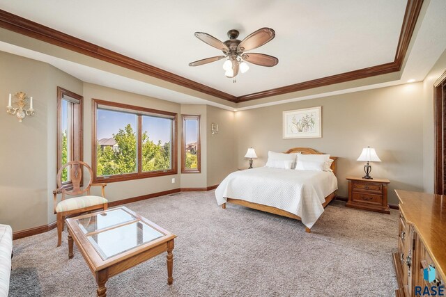 bedroom featuring crown molding, carpet flooring, ensuite bathroom, and ceiling fan