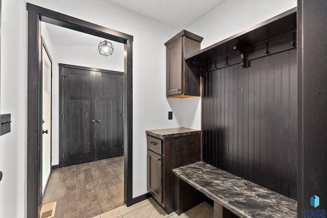 mudroom with light wood-type flooring