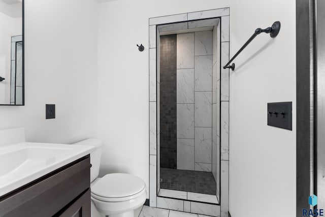 5413 E 64th St, Sioux Falls, SD 57108 - bathroom with toilet, a stall shower, marble finish floor, and vanity