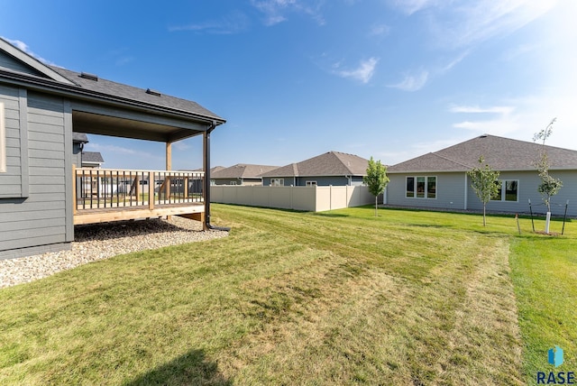 view of yard featuring a wooden deck