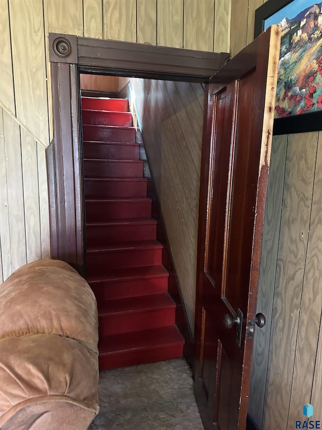 101 N Seaman St, Delmont, SD 57330 - unfurnished room featuring hardwood / wood-style floors, wood walls, and visible vents