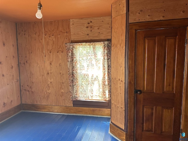 101 N Seaman St, Delmont, SD 57330 - hall featuring dark wood-type flooring and wood walls