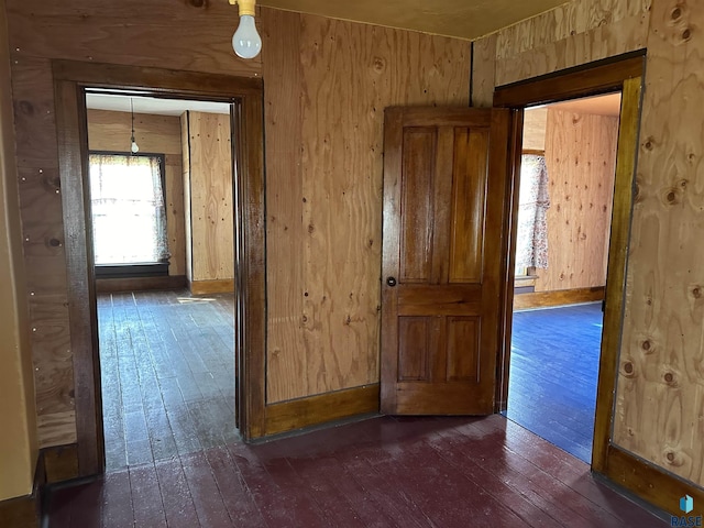 101 N Seaman St, Delmont, SD 57330 - interior space with a textured ceiling, wood walls, stairway, and hardwood / wood-style floors