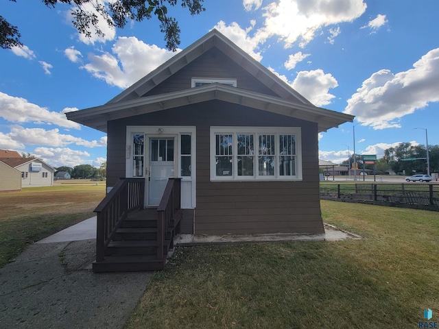 exterior space featuring a front lawn