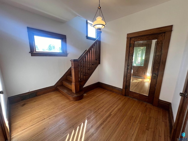 interior space with hardwood / wood-style floors