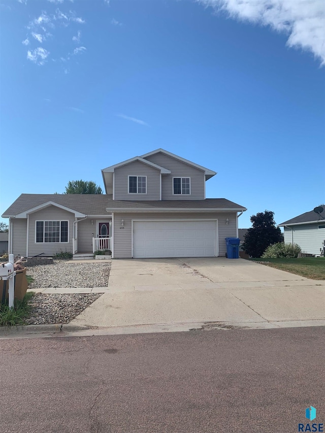 front of property with a garage