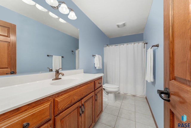 bathroom featuring vanity, a shower with shower curtain, tile patterned flooring, and toilet