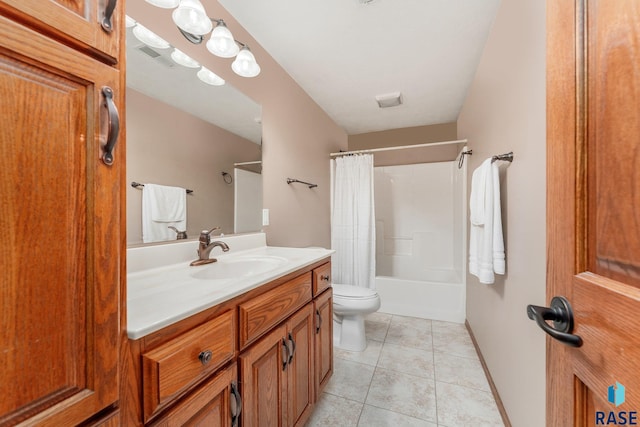 full bathroom featuring vanity, shower / bath combo with shower curtain, tile patterned flooring, and toilet