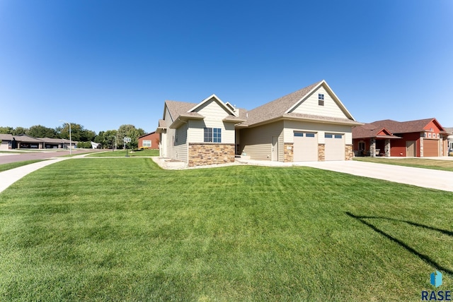 craftsman-style home featuring a garage and a front yard