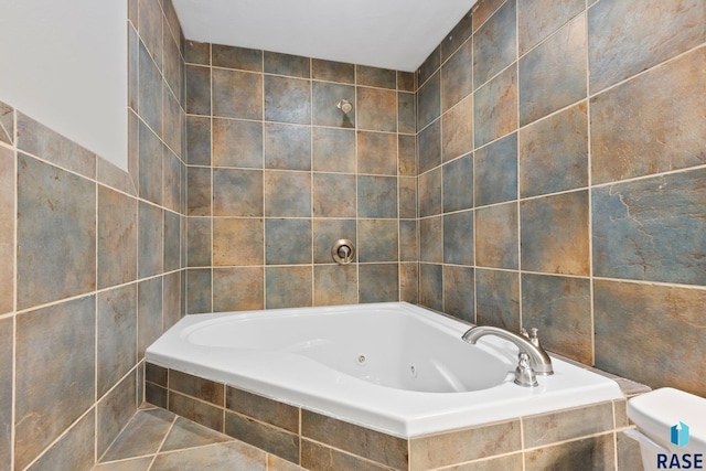 bathroom featuring tile walls and tiled tub