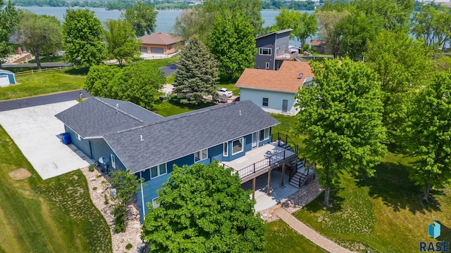 birds eye view of property featuring a water view