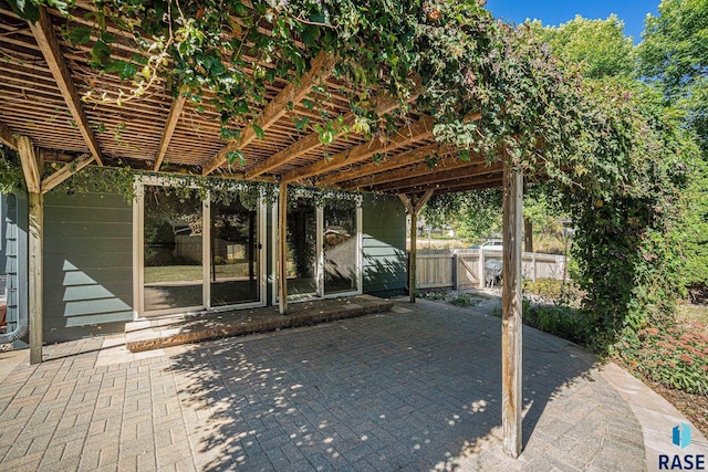 view of patio featuring a pergola