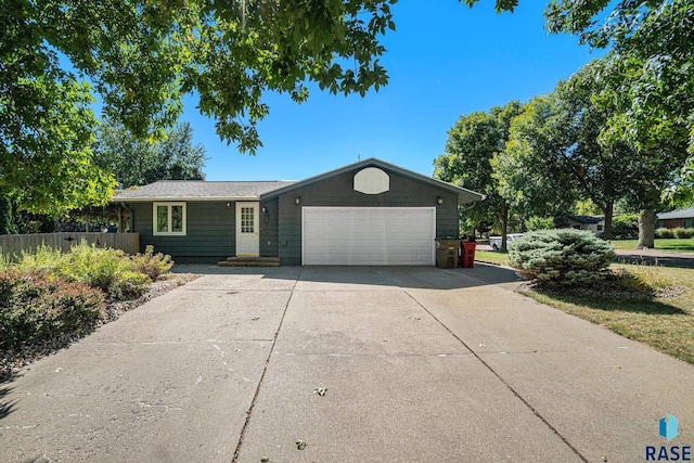 single story home with a garage