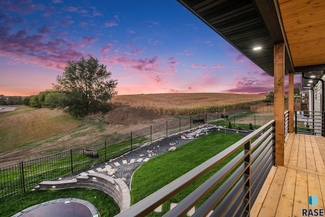 313 Red Spruce Ave, Sioux Falls, SD 57110 - balcony at dusk featuring a rural view