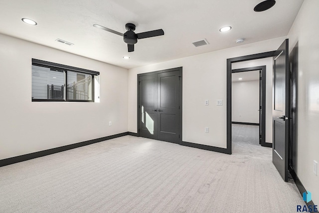 313 Red Spruce Ave, Sioux Falls, SD 57110 - unfurnished bedroom with visible vents, recessed lighting, and carpet