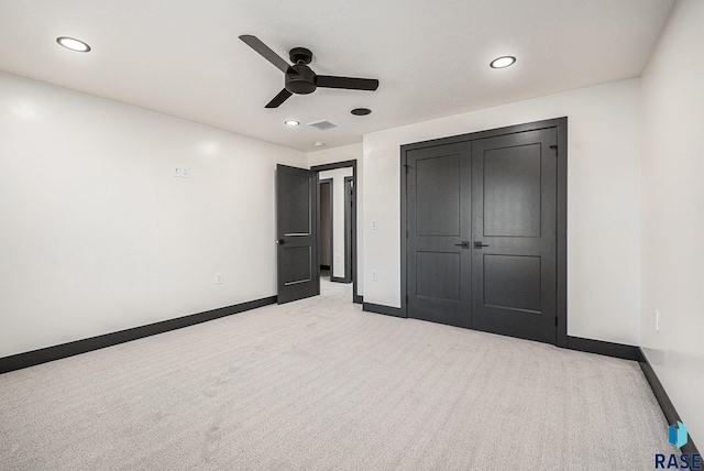313 Red Spruce Ave, Sioux Falls, SD 57110 - unfurnished bedroom with baseboards, recessed lighting, ceiling fan, and light carpet