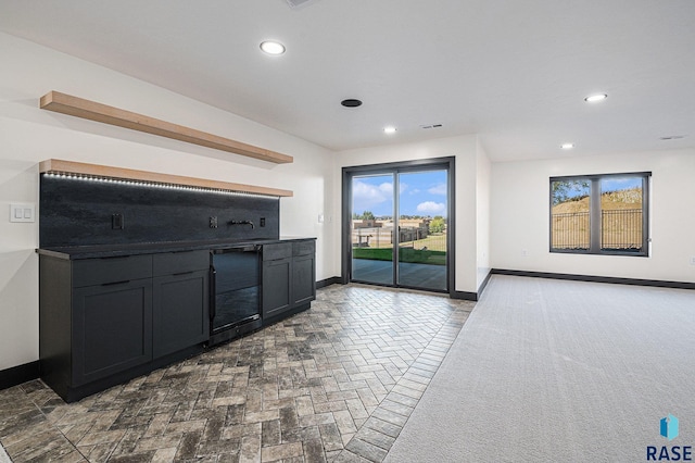 313 Red Spruce Ave, Sioux Falls, SD 57110 - kitchen featuring recessed lighting, visible vents, baseboards, and a healthy amount of sunlight