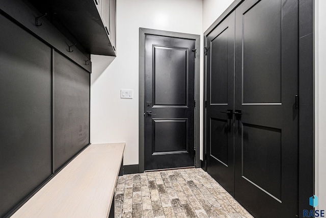 313 Red Spruce Ave, Sioux Falls, SD 57110 - mudroom featuring baseboards