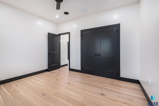 313 Red Spruce Ave, Sioux Falls, SD 57110 - unfurnished bedroom featuring baseboards, light wood-type flooring, and a ceiling fan