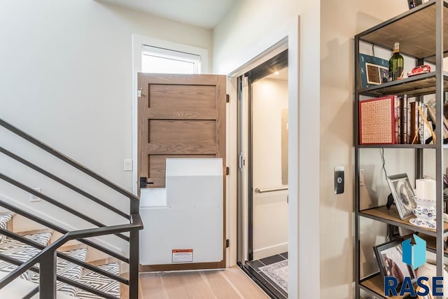 entryway featuring light hardwood / wood-style floors