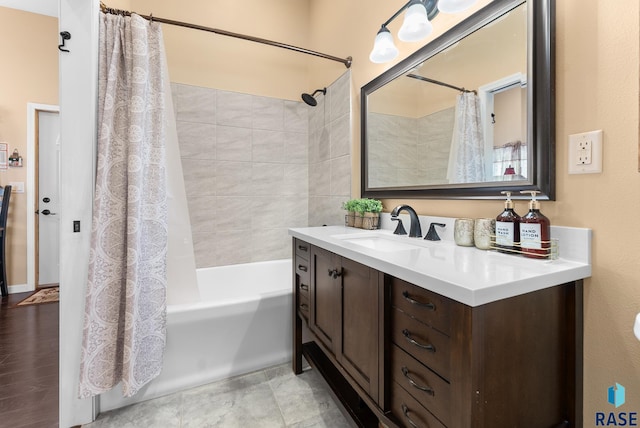 bathroom featuring shower / tub combo, vanity, and hardwood / wood-style floors