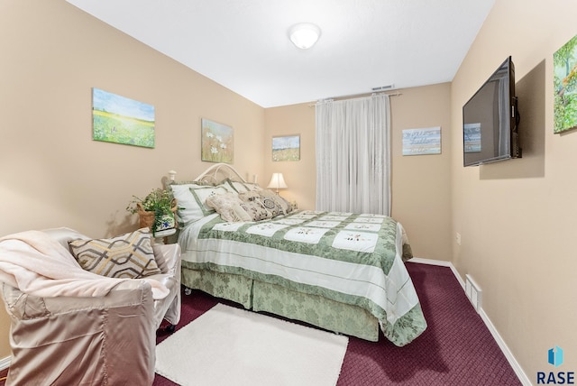 bedroom featuring carpet