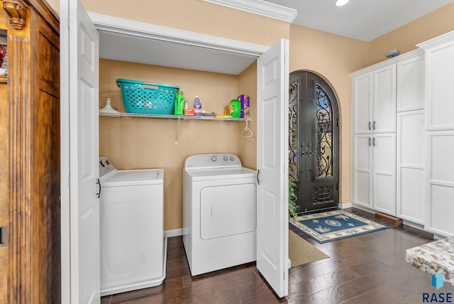 laundry area featuring dark hardwood / wood-style flooring and washer and dryer