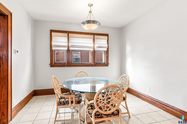 dining room featuring light tile patterned flooring