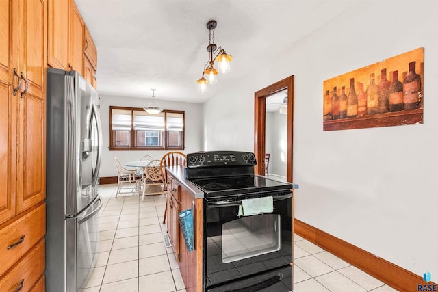 kitchen with stainless steel refrigerator with ice dispenser, black electric range, light tile patterned floors, and decorative light fixtures