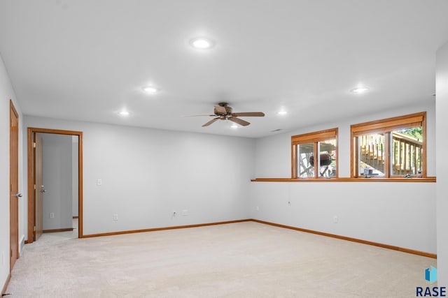 unfurnished room featuring baseboards, ceiling fan, recessed lighting, and light colored carpet