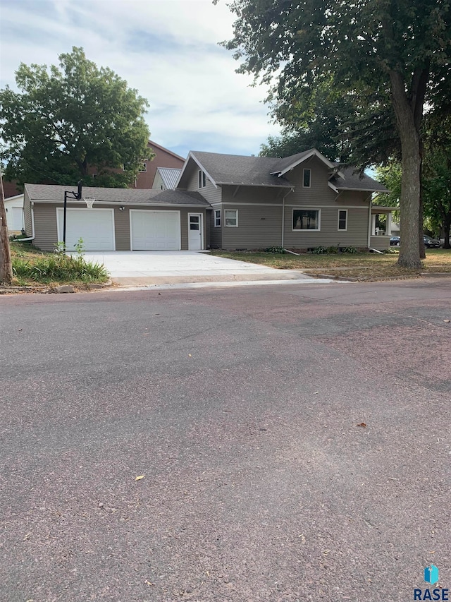 ranch-style house featuring a garage