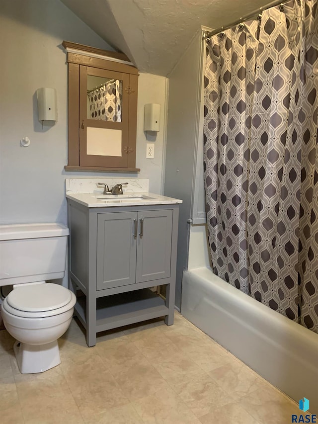 full bathroom featuring shower / tub combo with curtain, lofted ceiling, vanity, and toilet