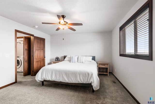 bedroom with carpet, ceiling fan, and washer / clothes dryer