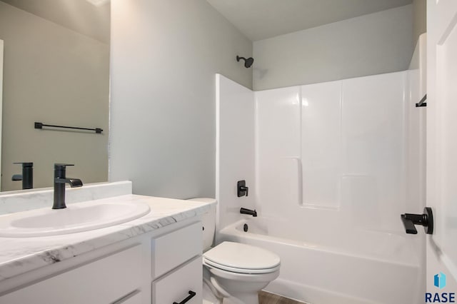 full bathroom featuring wood-type flooring, vanity, shower / bath combination, and toilet