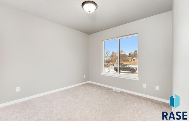 unfurnished room with carpet