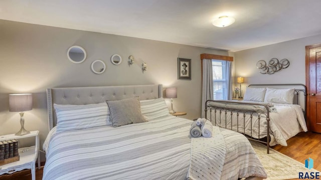 bedroom featuring hardwood / wood-style flooring