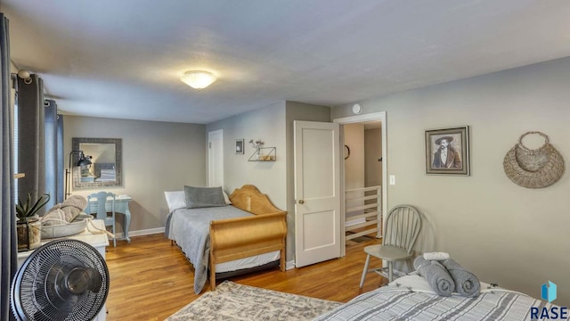 bedroom with light hardwood / wood-style flooring