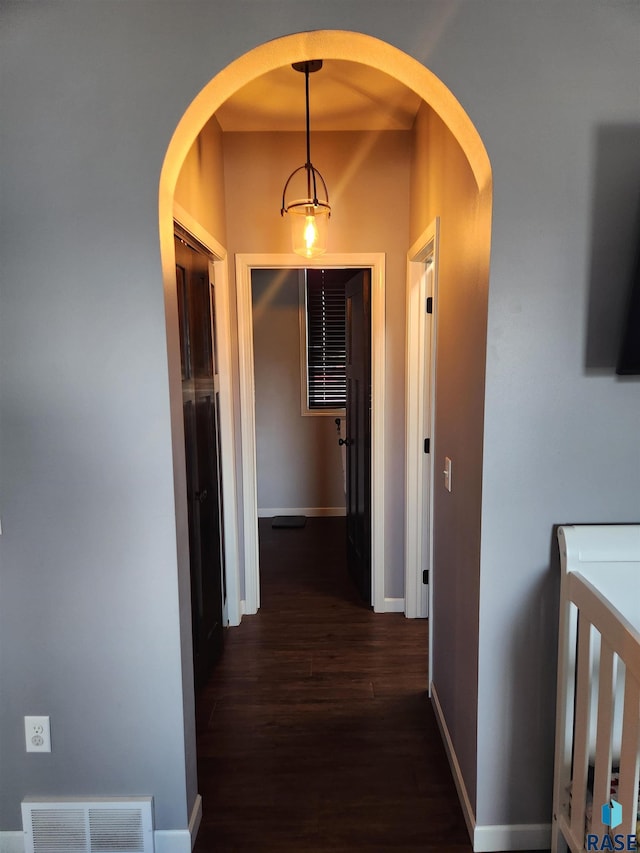 hall featuring dark hardwood / wood-style flooring