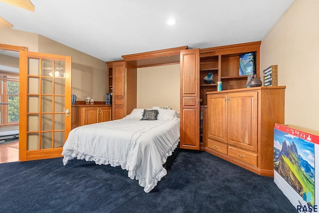 carpeted bedroom featuring lofted ceiling