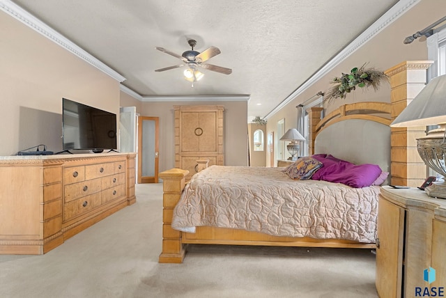 bedroom featuring a textured ceiling, ceiling fan, light colored carpet, and crown molding