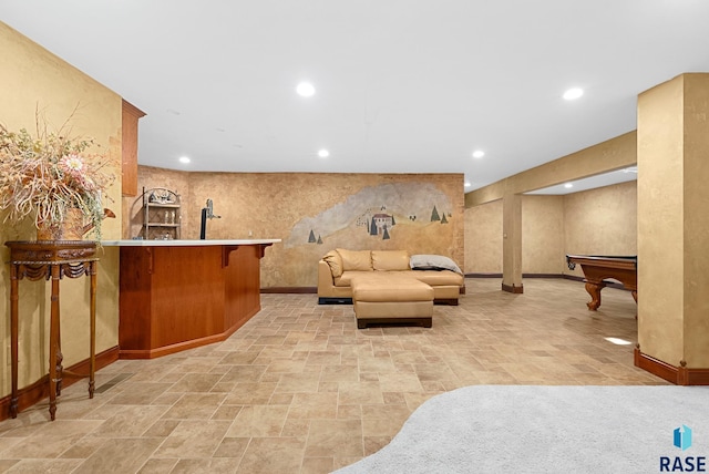 interior space with pool table and indoor bar